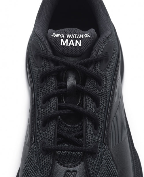 Black New Balance TF100