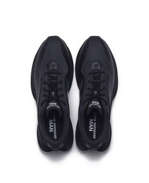 Black New Balance TF100