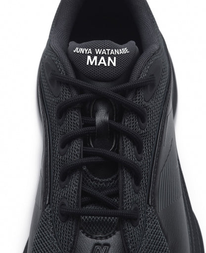 Black New Balance TF100