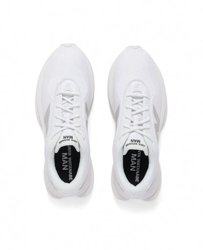 White New Balance TF100